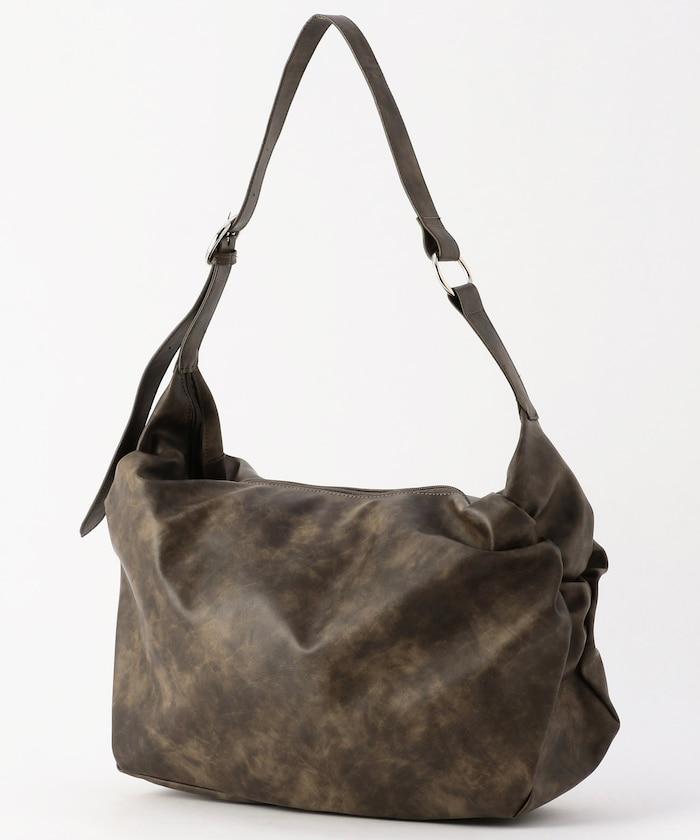 皮質圓形鉚釘肩揹包