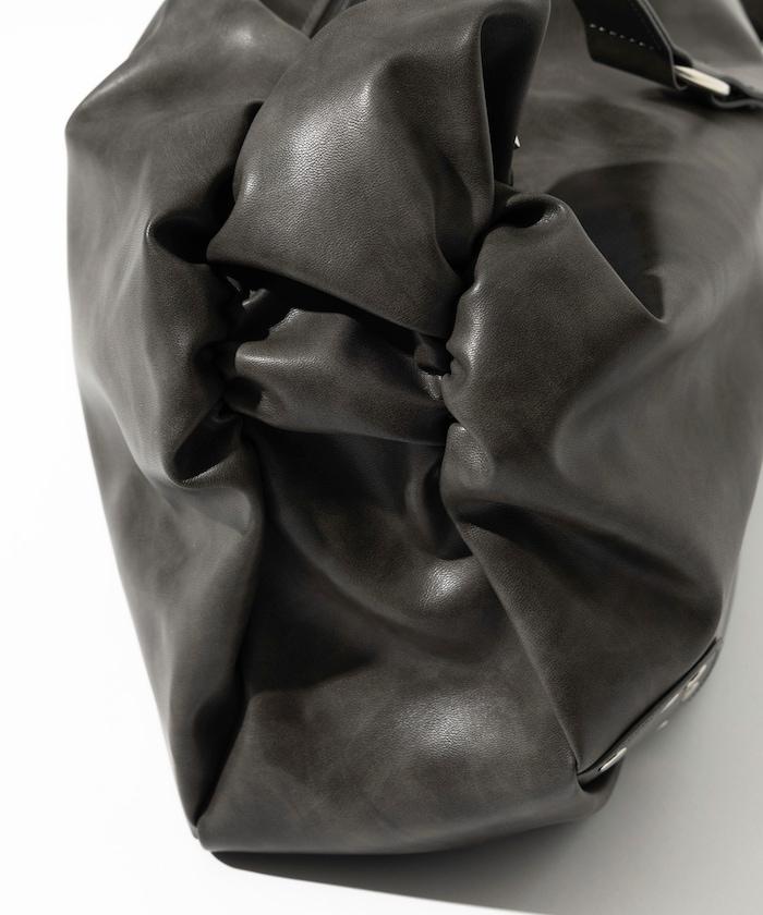 皮質圓形鉚釘肩揹包