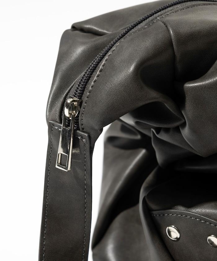 皮質圓形鉚釘肩揹包