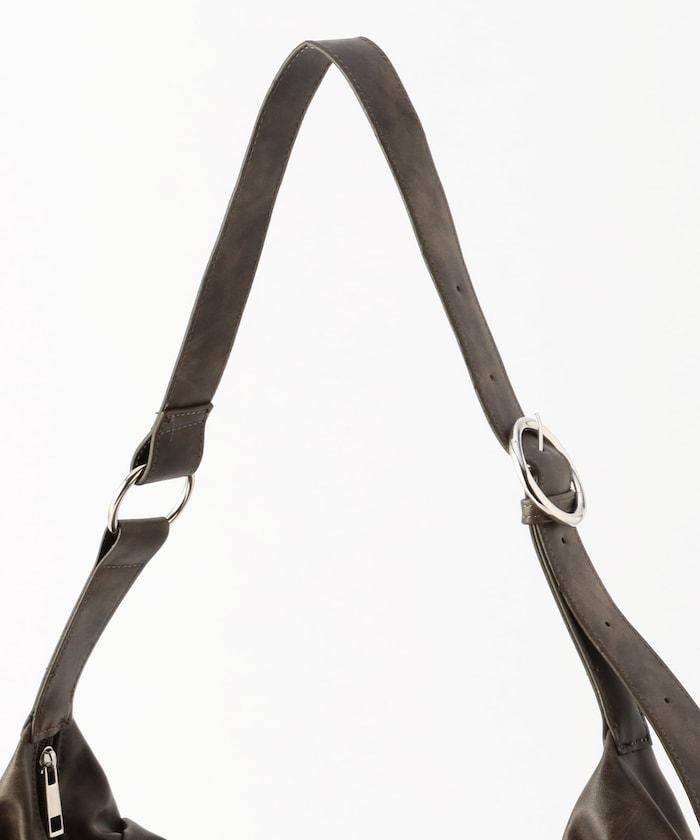 皮質圓形鉚釘肩揹包