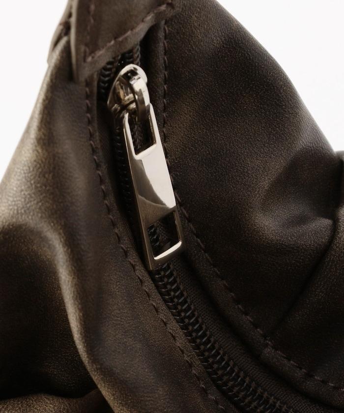 皮質圓形鉚釘肩揹包