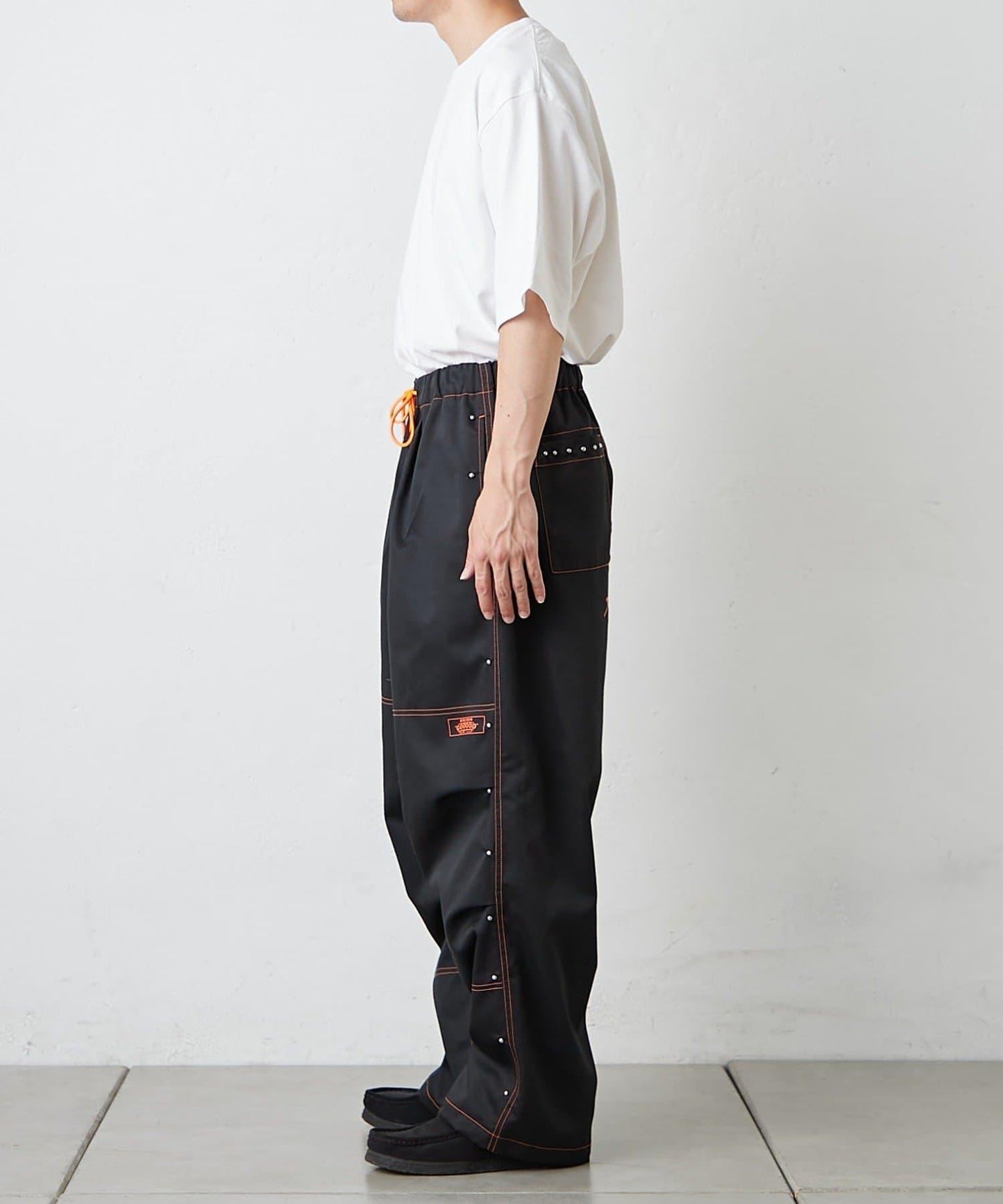 【SG】雙層膝部鉚釘傘布褲