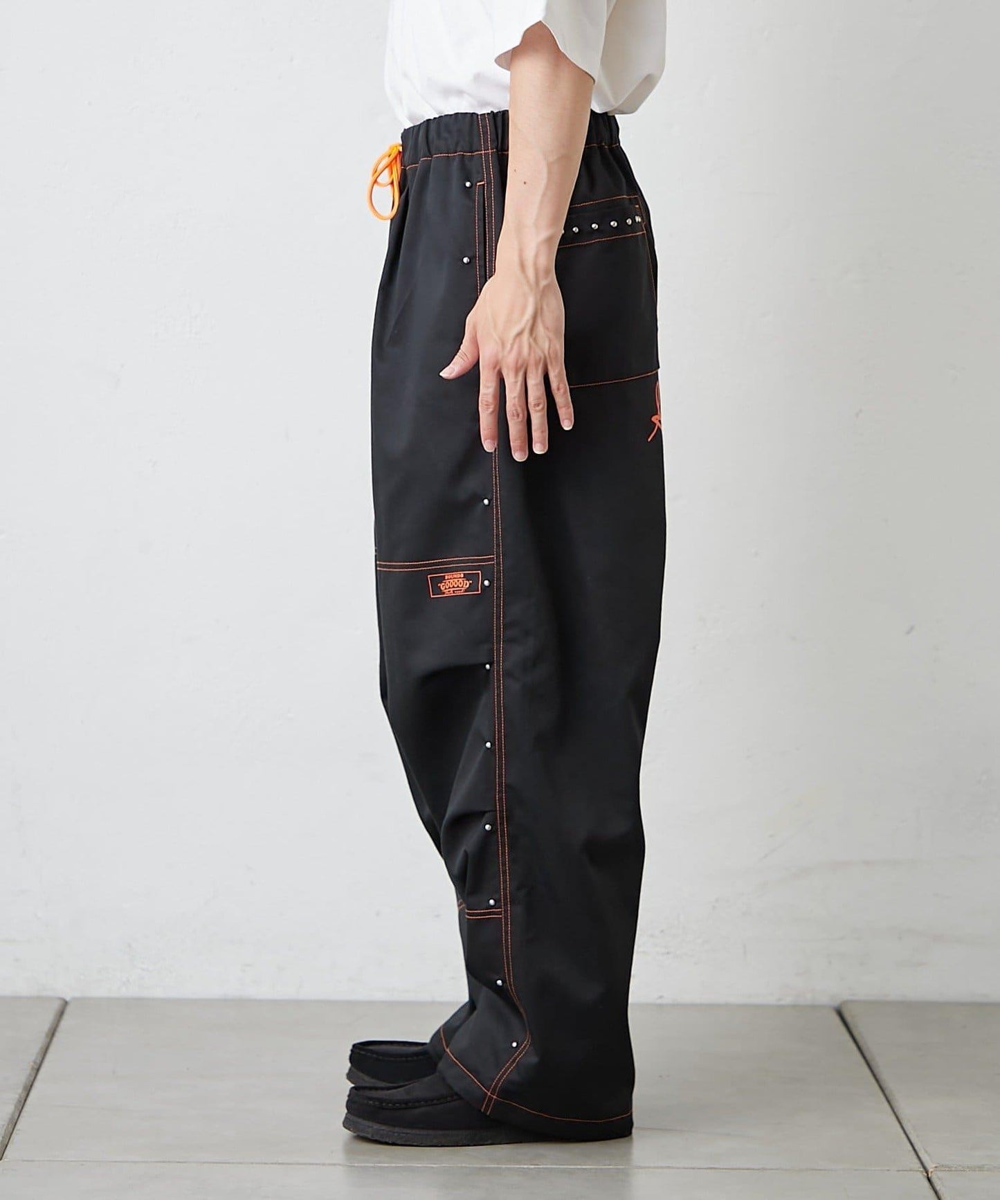 【SG】雙層膝部鉚釘傘布褲