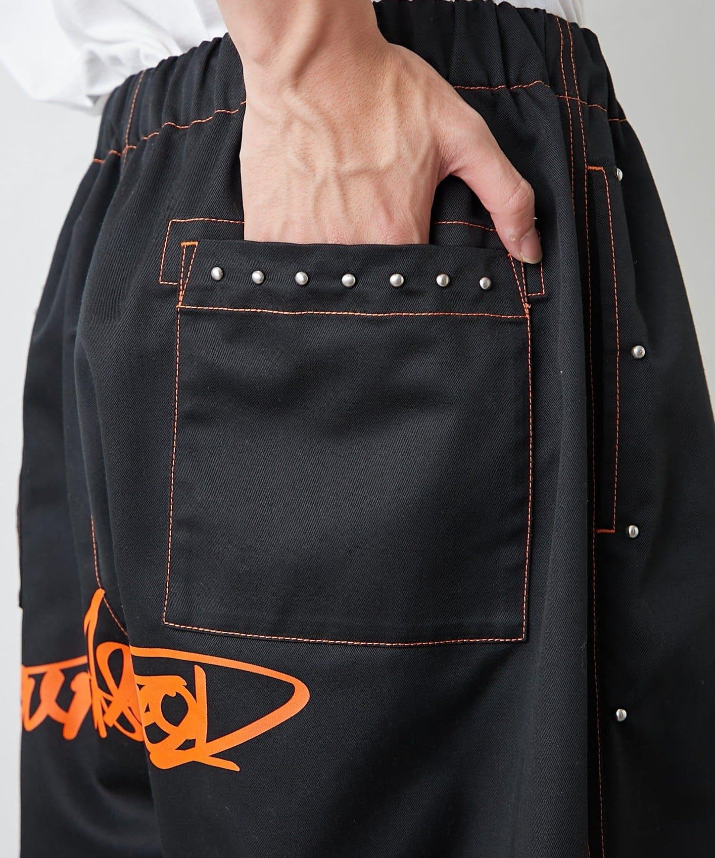 【SG】雙層膝部鉚釘傘布褲