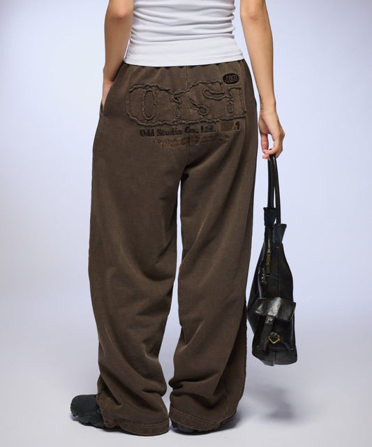 【OddStudio】ピグメントバックダメージロゴスウェットパンツ