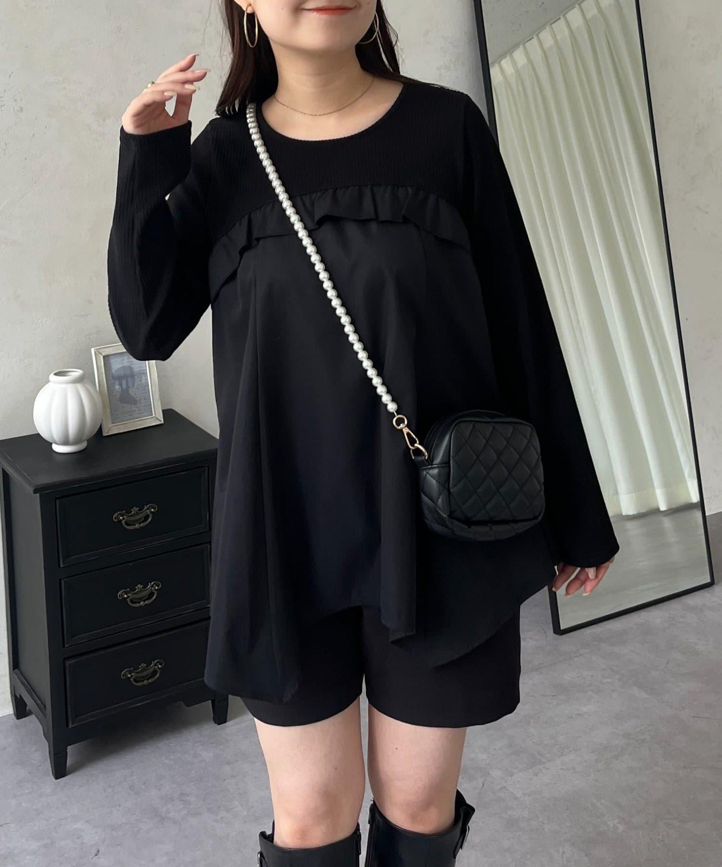 不規則下襬荷葉邊拼接A字羅紋長袖T恤