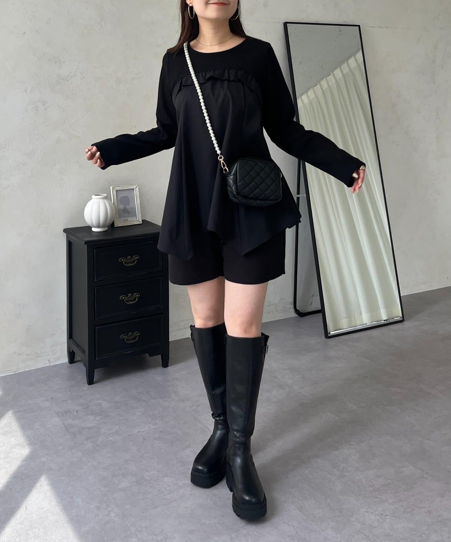 不規則下襬荷葉邊拼接A字羅紋長袖T恤