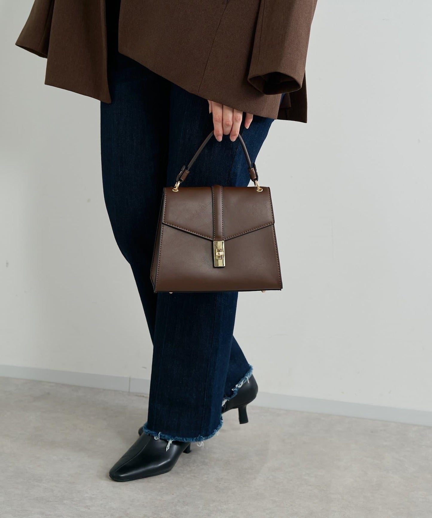 扭扣金屬單手柄波士頓包