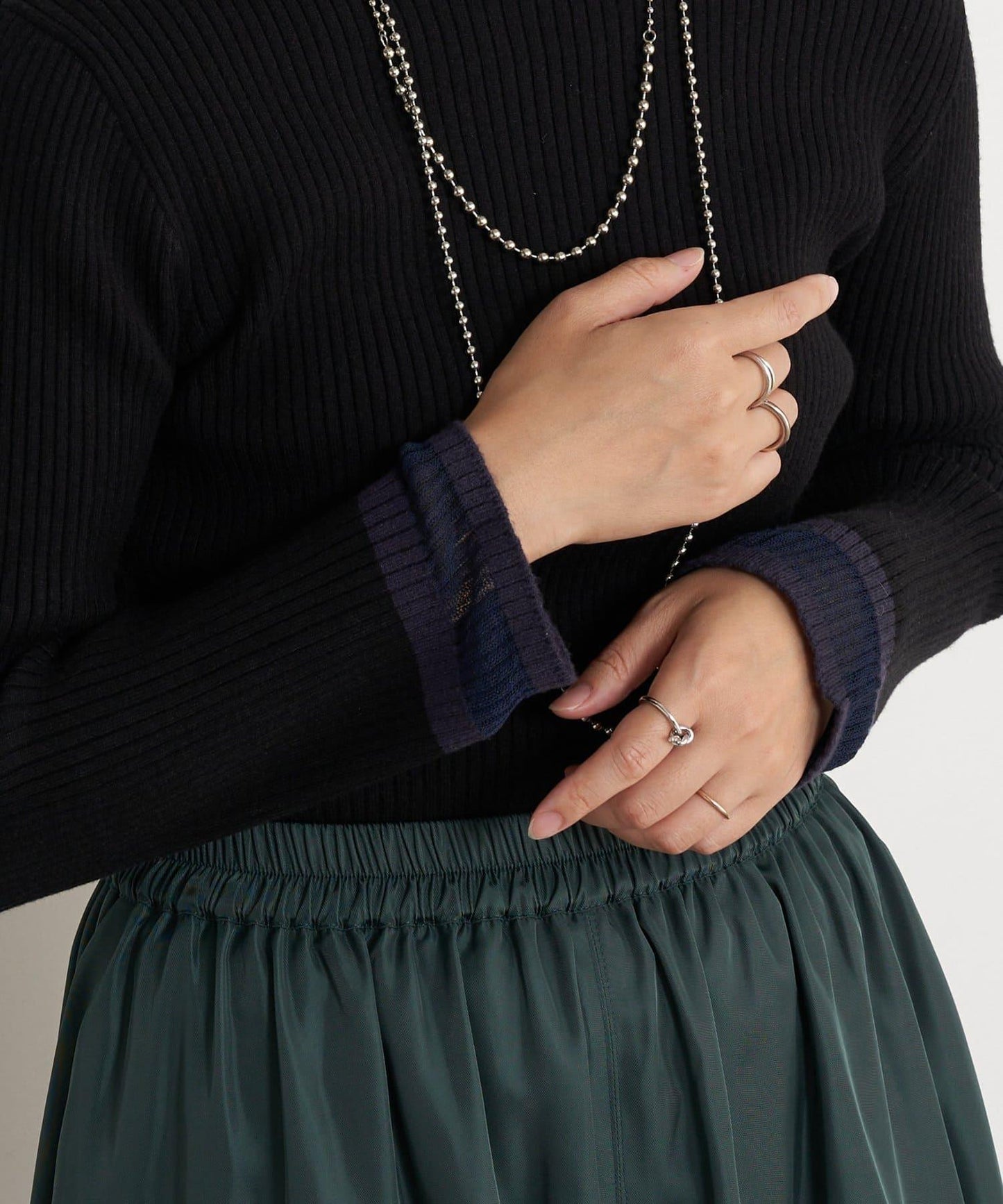 袖部透視拼接羅紋針織衫