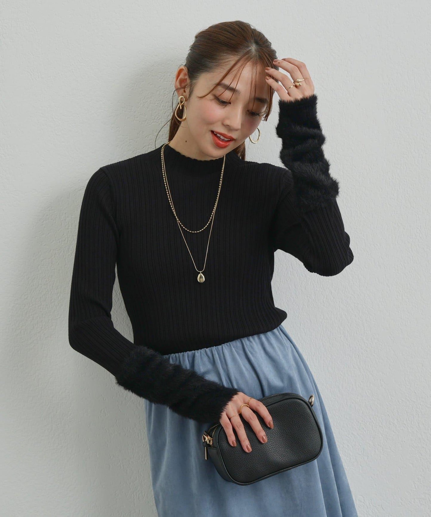 袖部毛絨拼接不規則羅紋針織衫