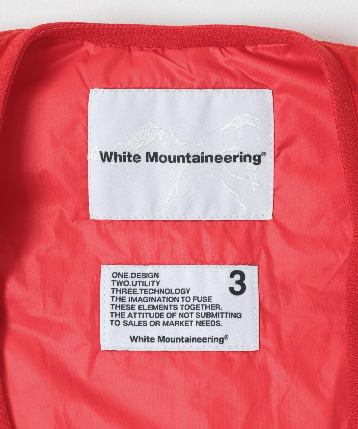 WHITE MOUNTAINEERING 菱格絎縫羽絨馬甲