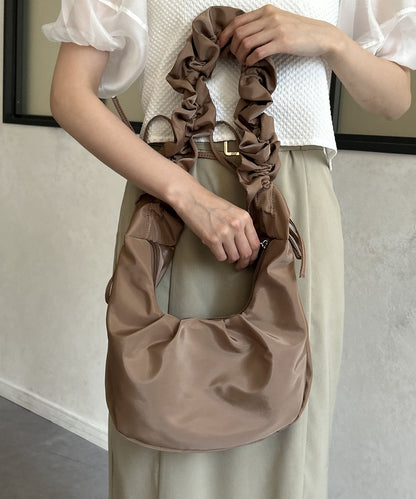 手柄收褶尼龍包