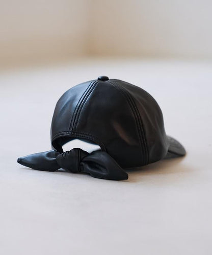 PU絲帶帽/仿皮帽