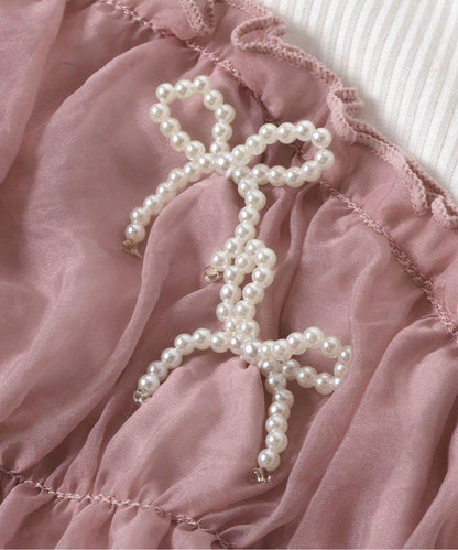 珍珠蝴蝶結拼接上衣