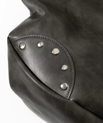 皮質圓形鉚釘肩揹包