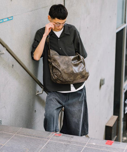 皮質圓形鉚釘肩揹包