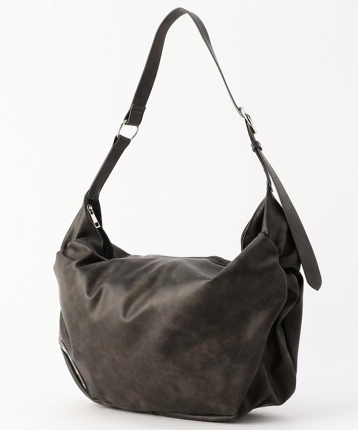 皮質圓形鉚釘肩揹包