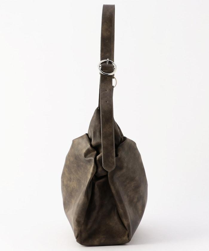 皮質圓形鉚釘肩揹包