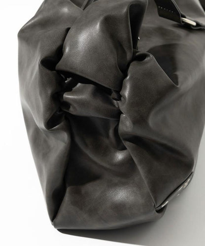 皮質圓形鉚釘肩揹包