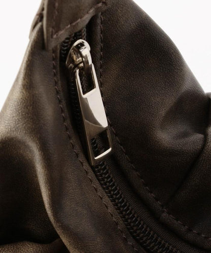 皮質圓形鉚釘肩揹包