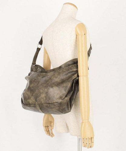 皮質圓形鉚釘肩揹包