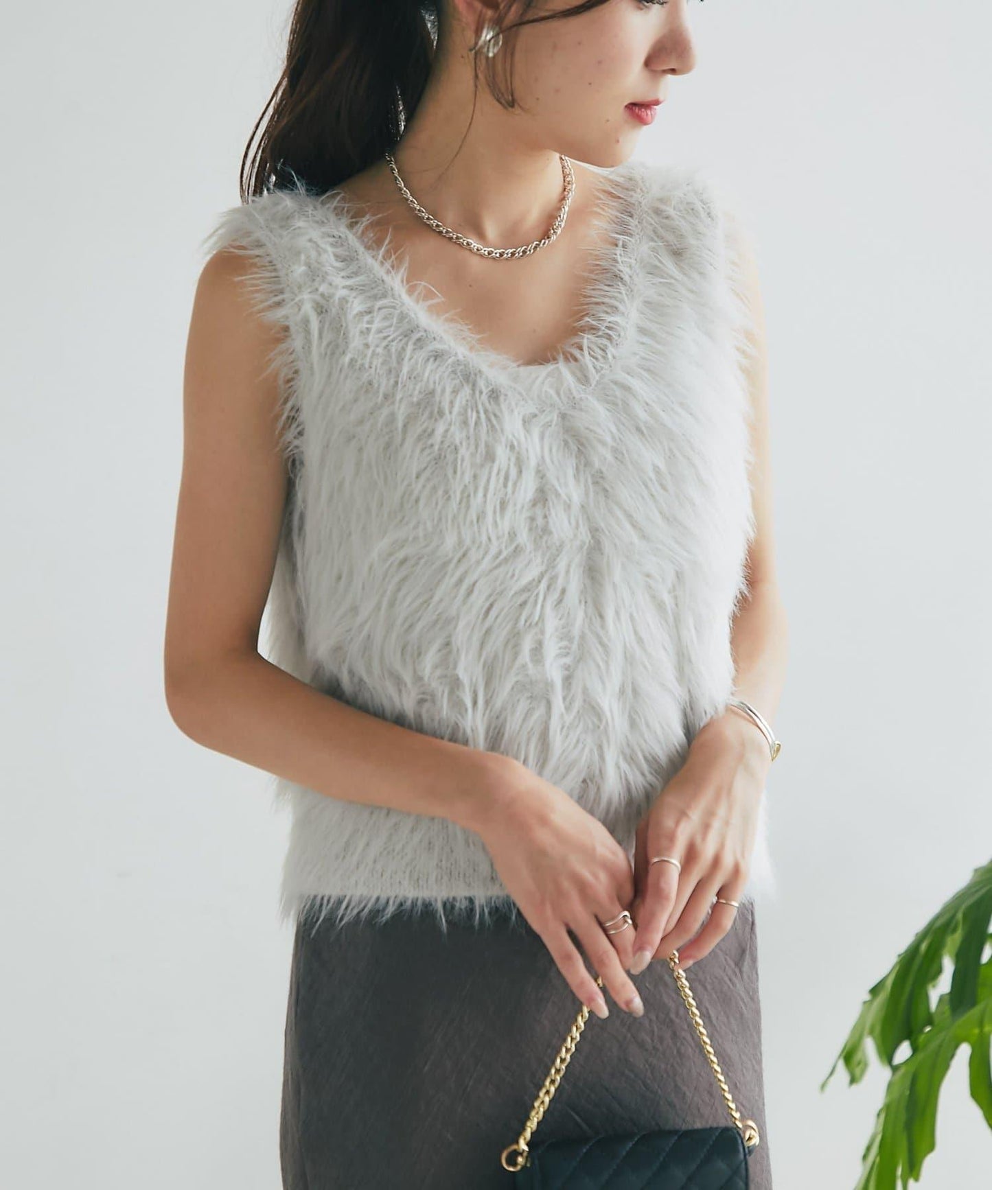 長款羽毛前後兩穿針織馬甲