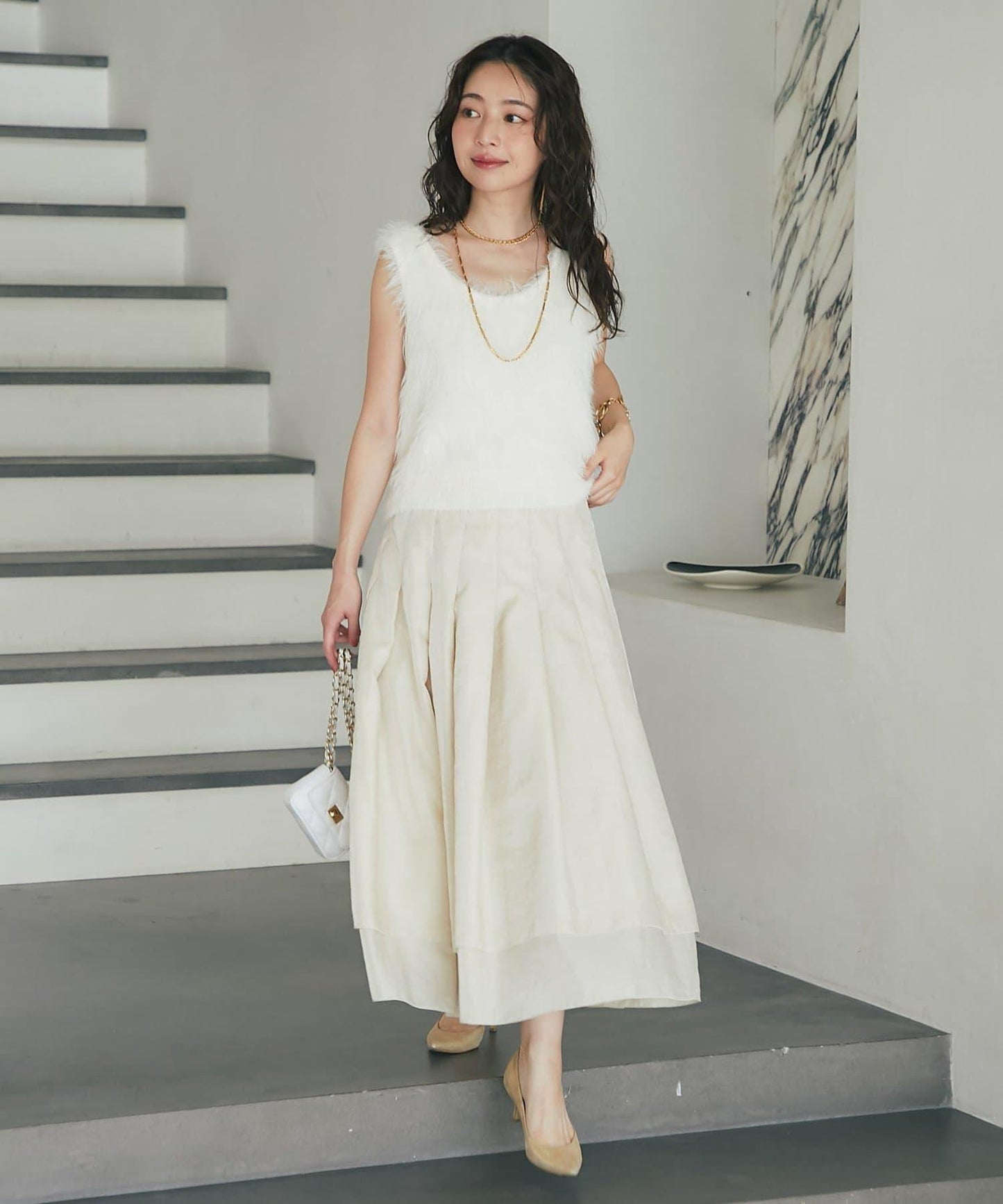 長款羽毛前後兩穿針織馬甲