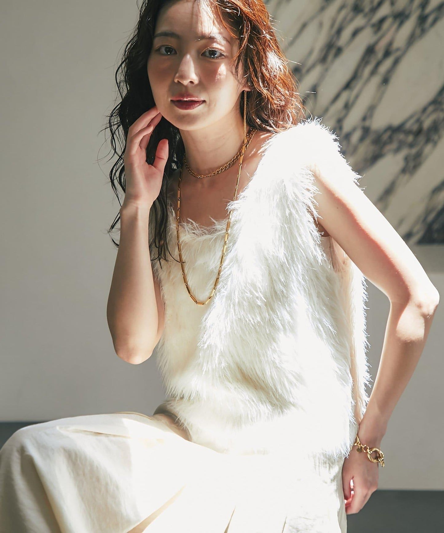 長款羽毛前後兩穿針織馬甲