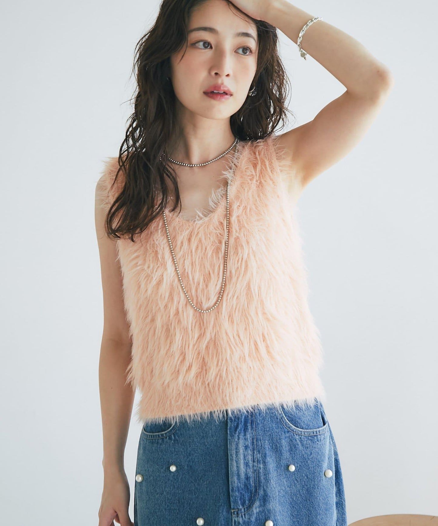 長款羽毛前後兩穿針織馬甲