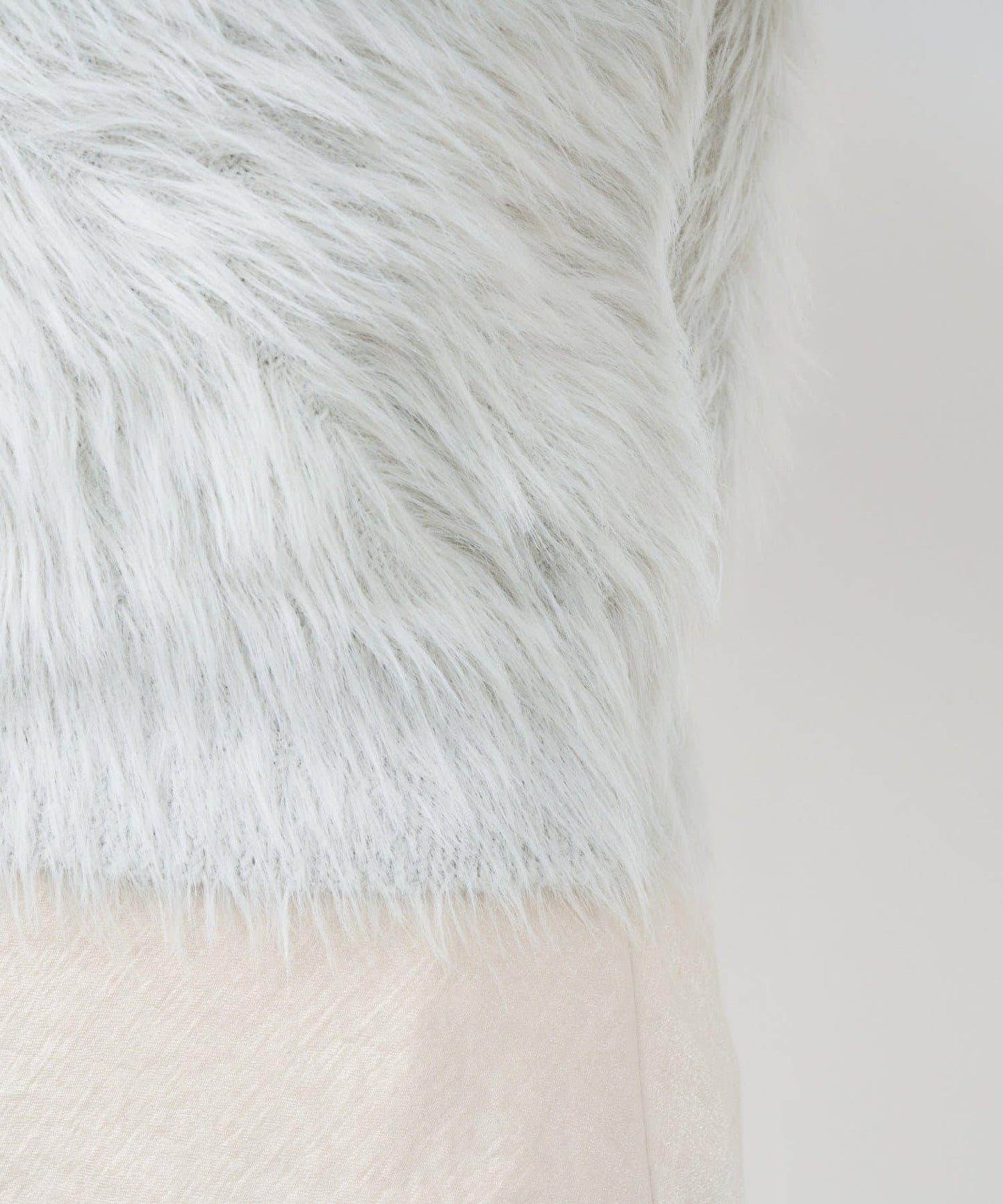 長款羽毛前後兩穿針織馬甲