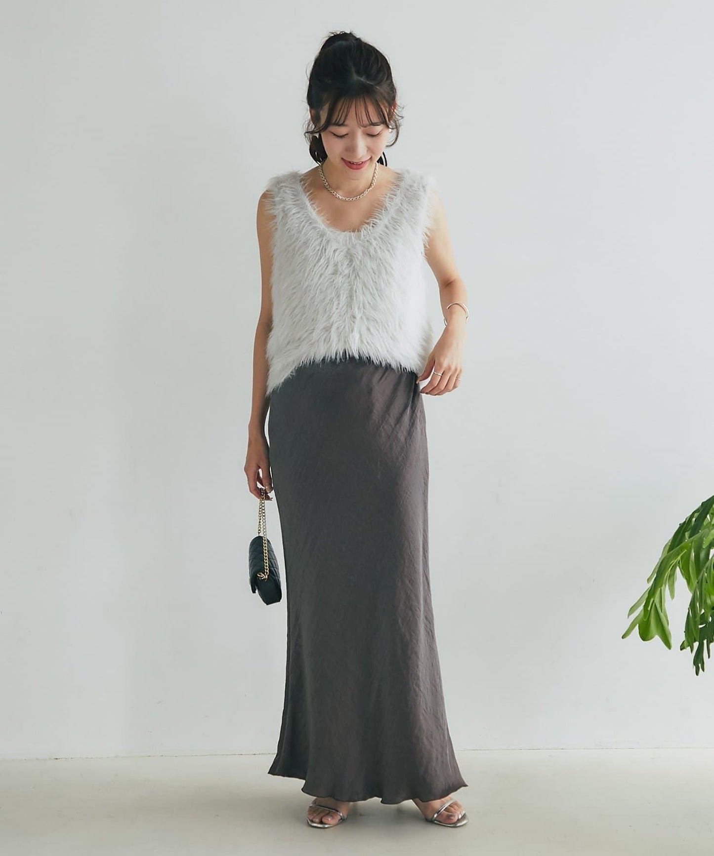 長款羽毛前後兩穿針織馬甲