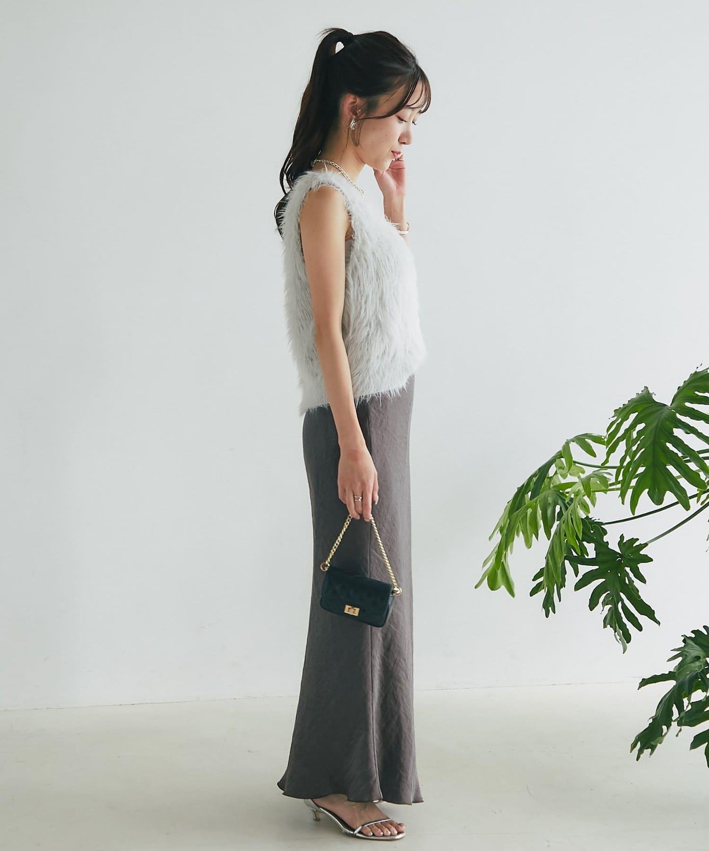 長款羽毛前後兩穿針織馬甲