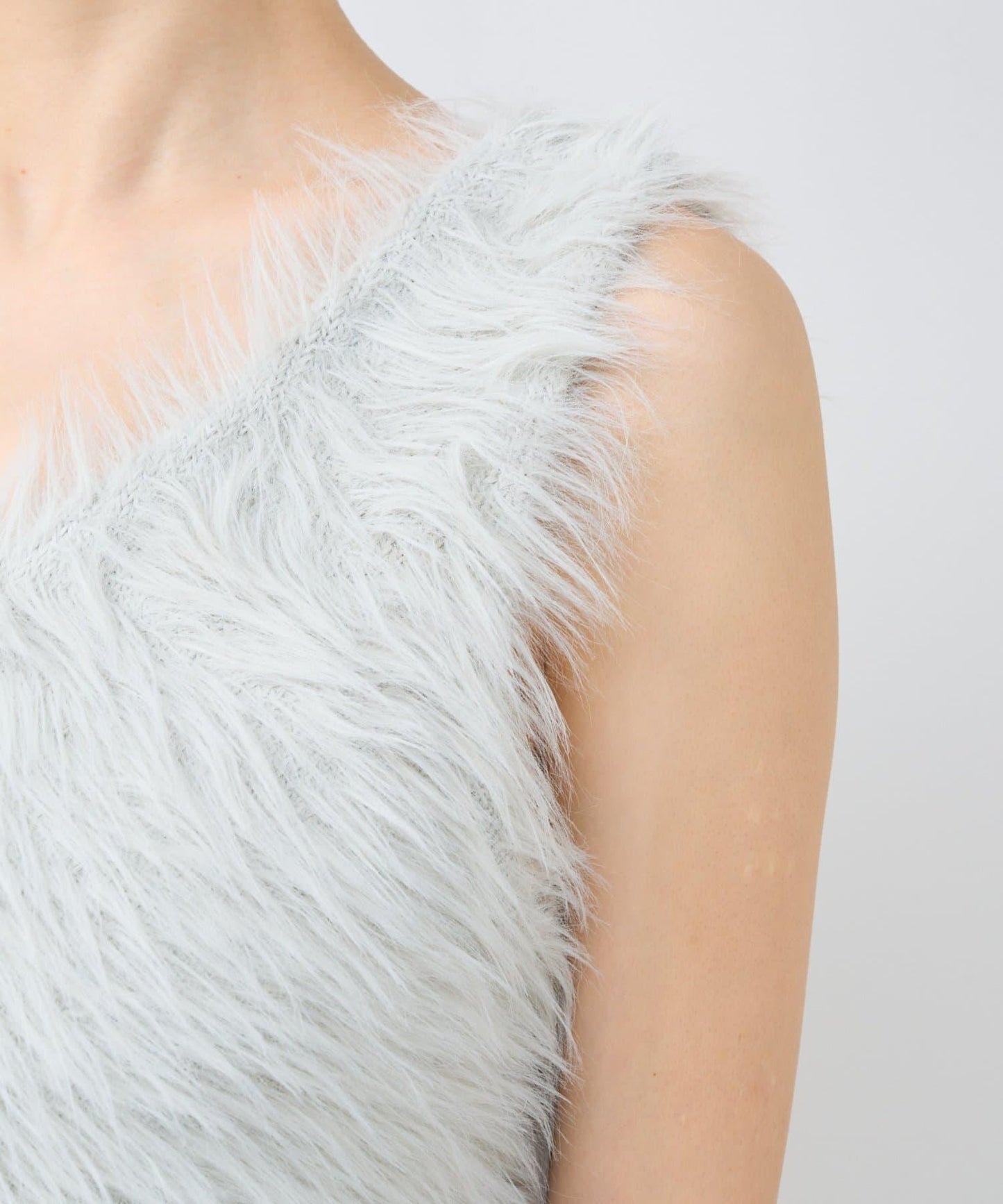 長款羽毛前後兩穿針織馬甲