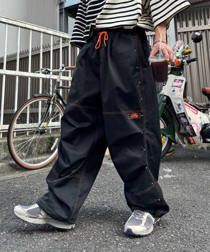 【SG】雙層膝部鉚釘傘布褲