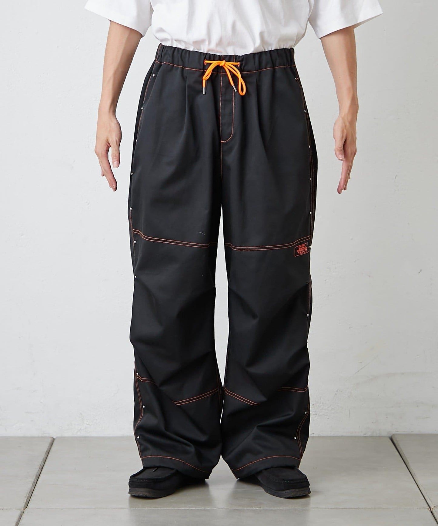 【SG】雙層膝部鉚釘傘布褲