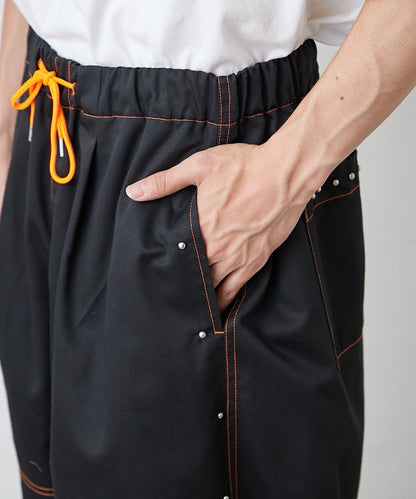 【SG】雙層膝部鉚釘傘布褲