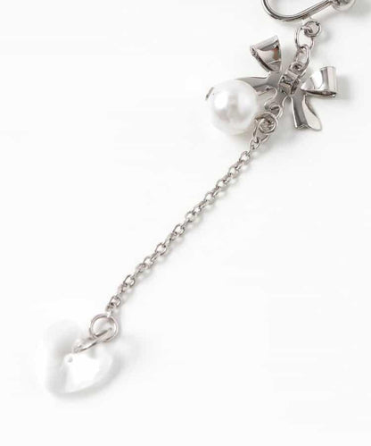 十字花飾天使耳環