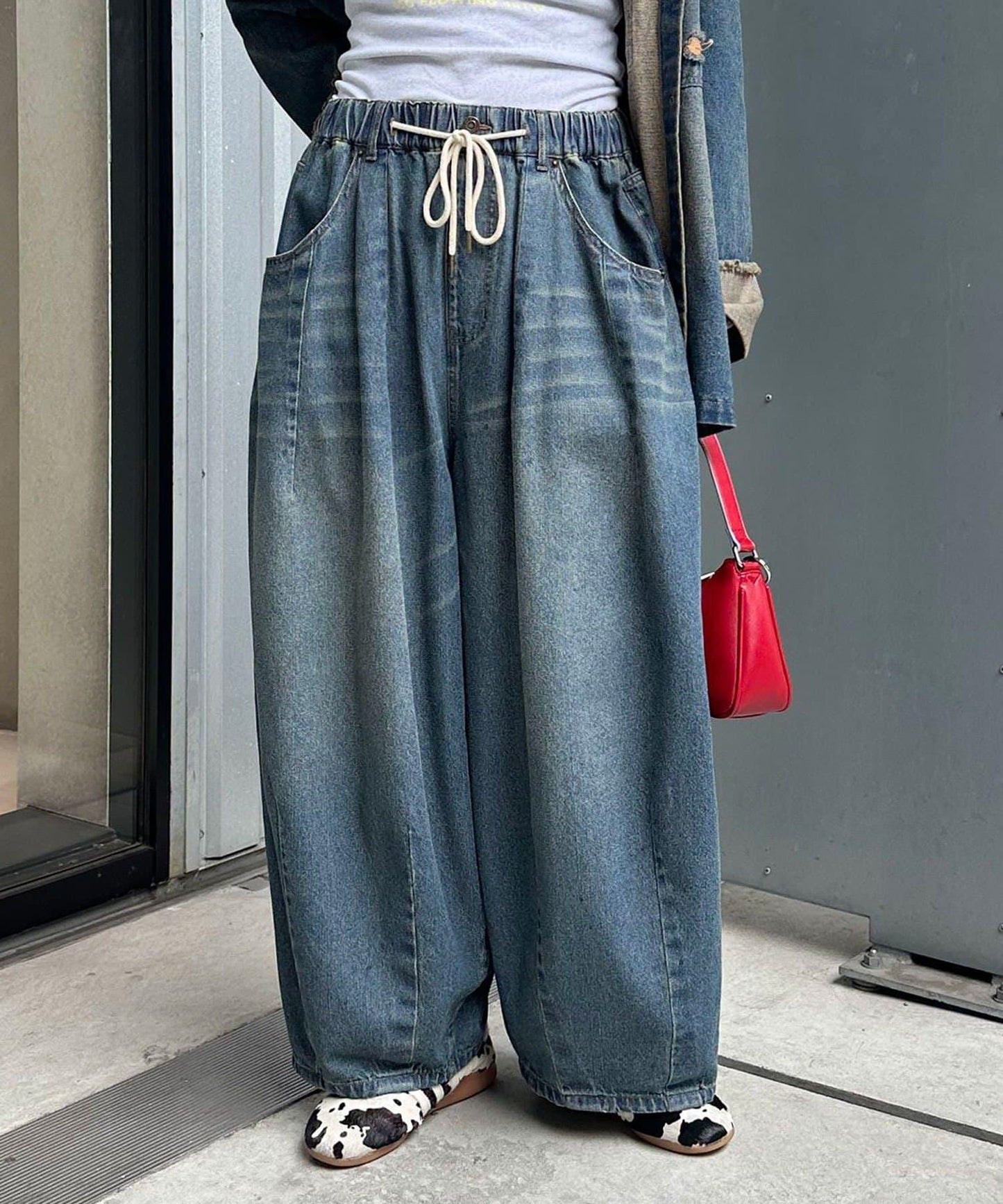 超寬鬆彎曲牛仔褲
