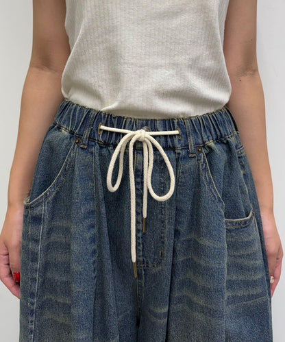 超寬鬆彎曲牛仔褲