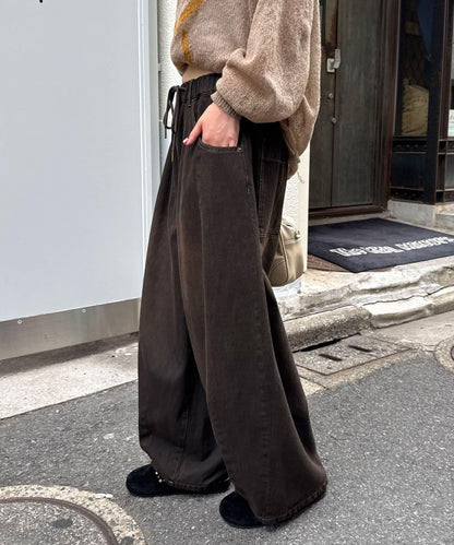超寬鬆彎曲牛仔褲