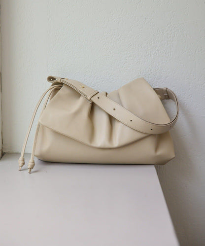 皮革翻蓋單肩包