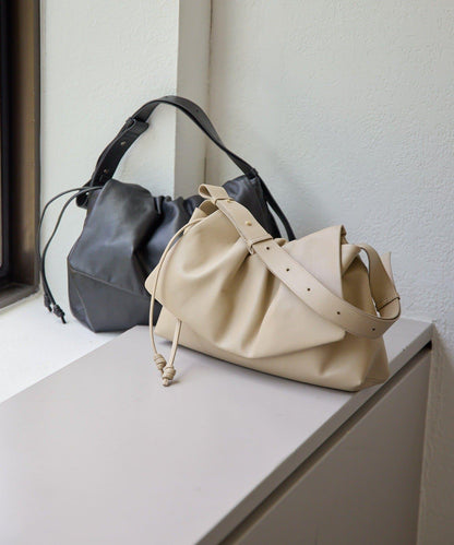 皮革翻蓋單肩包