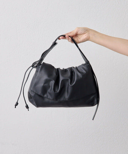 皮革翻蓋單肩包