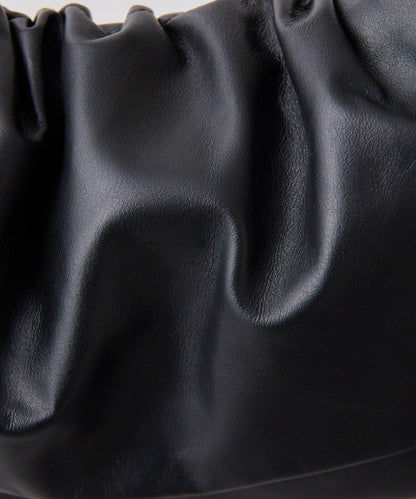 皮革翻蓋單肩包