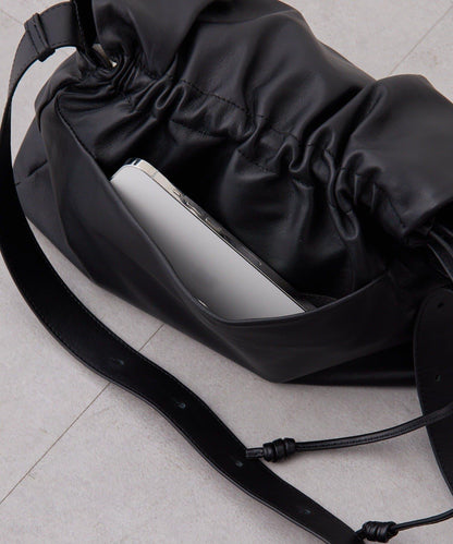 皮革翻蓋單肩包