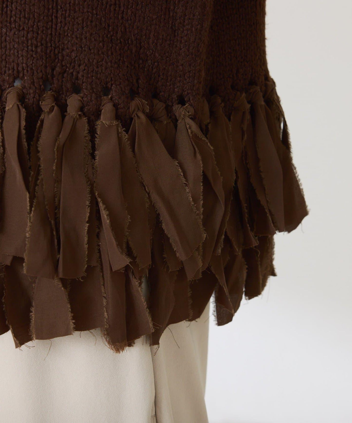 下襬流蘇針織衫