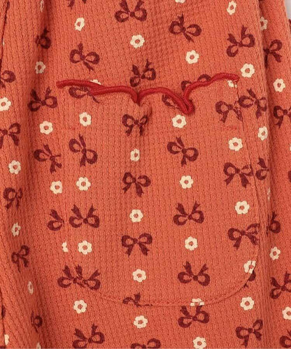 滿版圖案彈力華夫格下襬荷葉邊喇叭褲