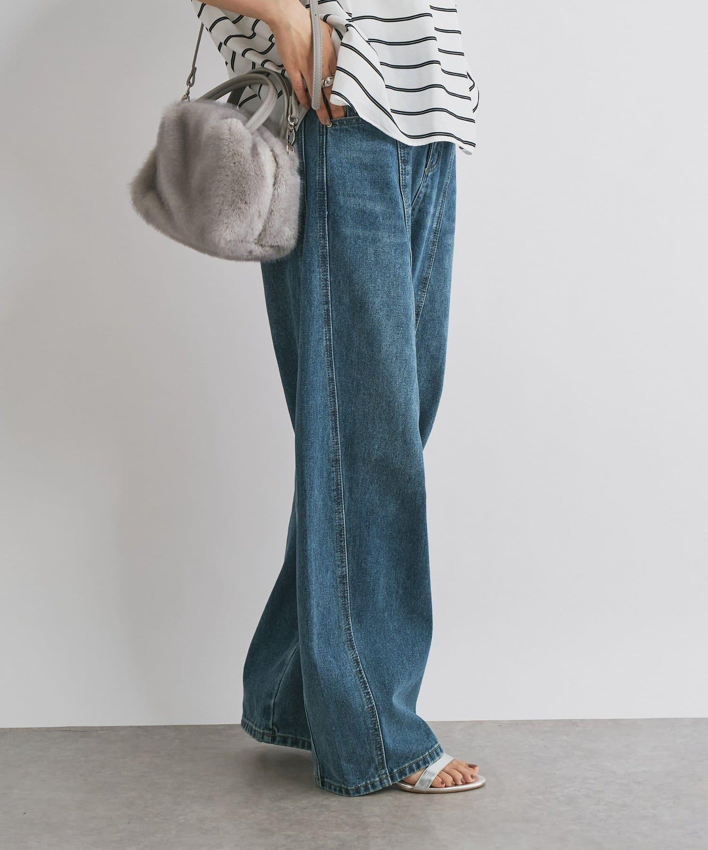 前片拼接弧形牛仔褲