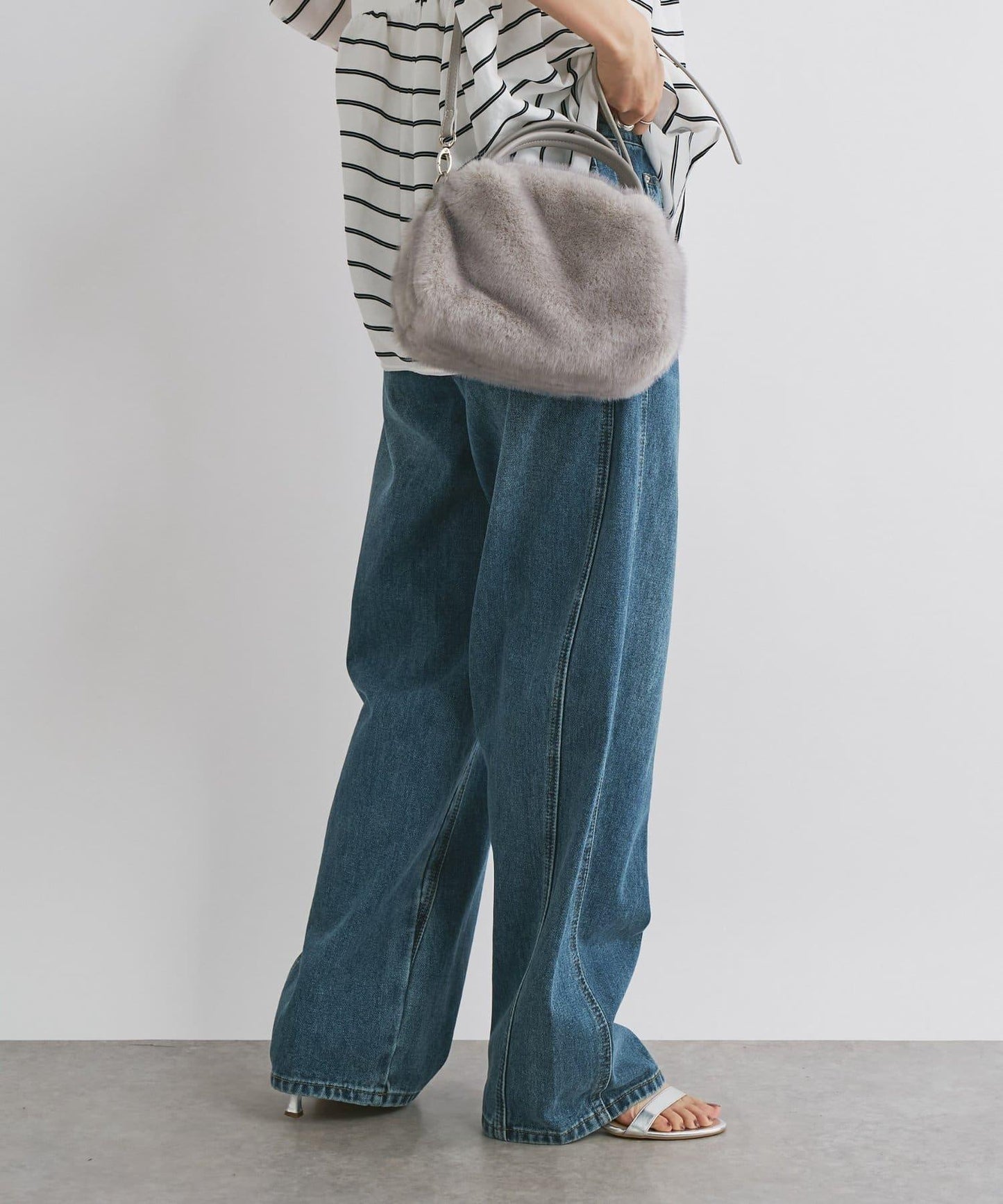 前片拼接弧形牛仔褲