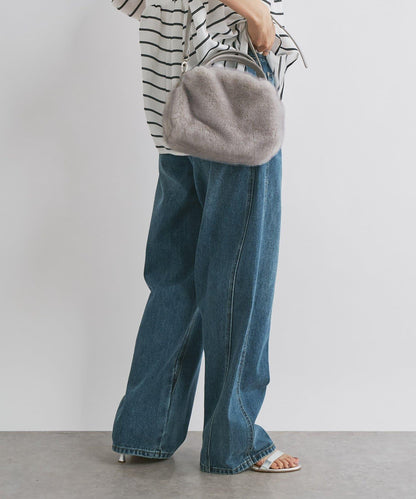 前片拼接弧形牛仔褲